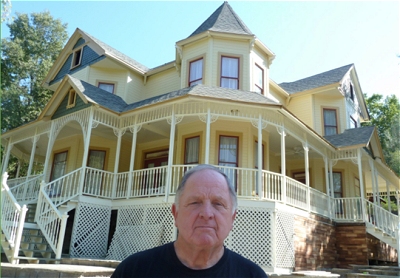 Arlo 'Chip' Lusby in front of his beloved Skunk Hollow. chip lusby at skunk hollow