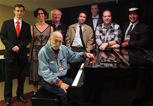 Danny (at the piano) with some of my fellow composers gathered around. danny matson and friends